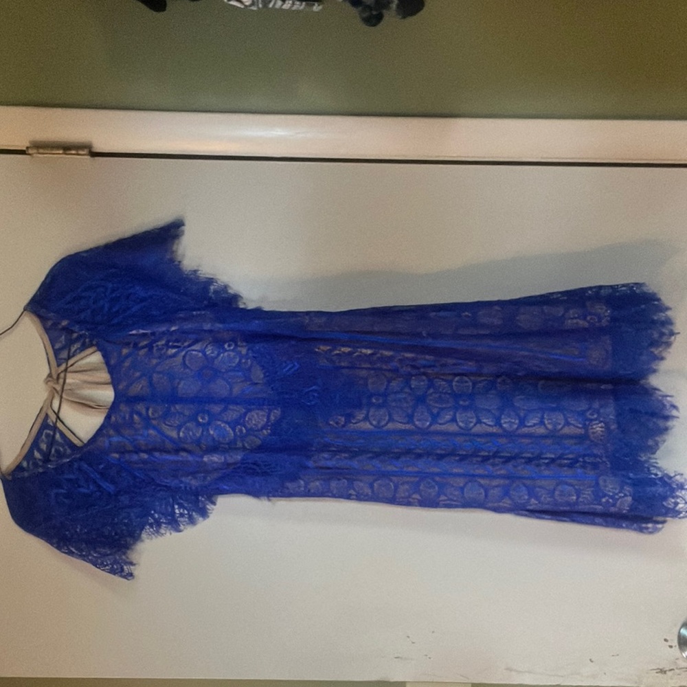Royal blue lace dress with open back.